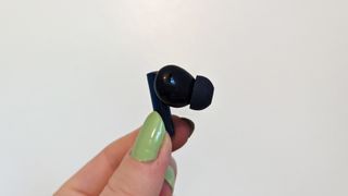 Realme Buds Air 3 review: single earbud held between fingers