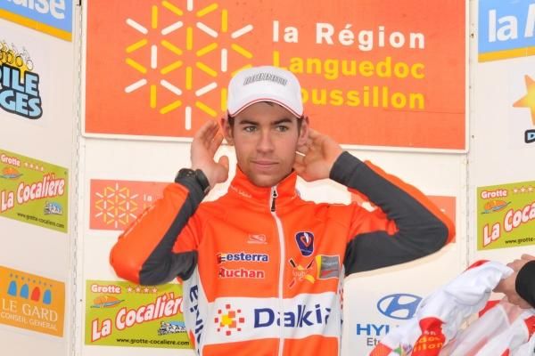Arnaud Molmy (Roubaix Lille Metropole) on stage to receive the best young rider jersey.