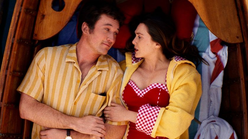 Larry (Miles Teller) and Joan (Elizabeth Olsen) in Eternity.