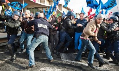 French pension-law protesters clash with police at Charles De Gaulle Airport