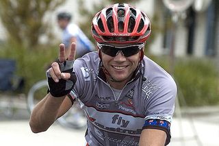 Fly V: Stage one winner Jonathan Cantwell gives his team salute in East Devonport.