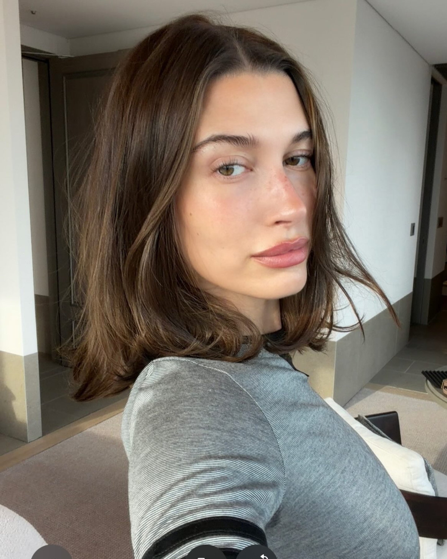 Blurred lips on Hailey Bieber