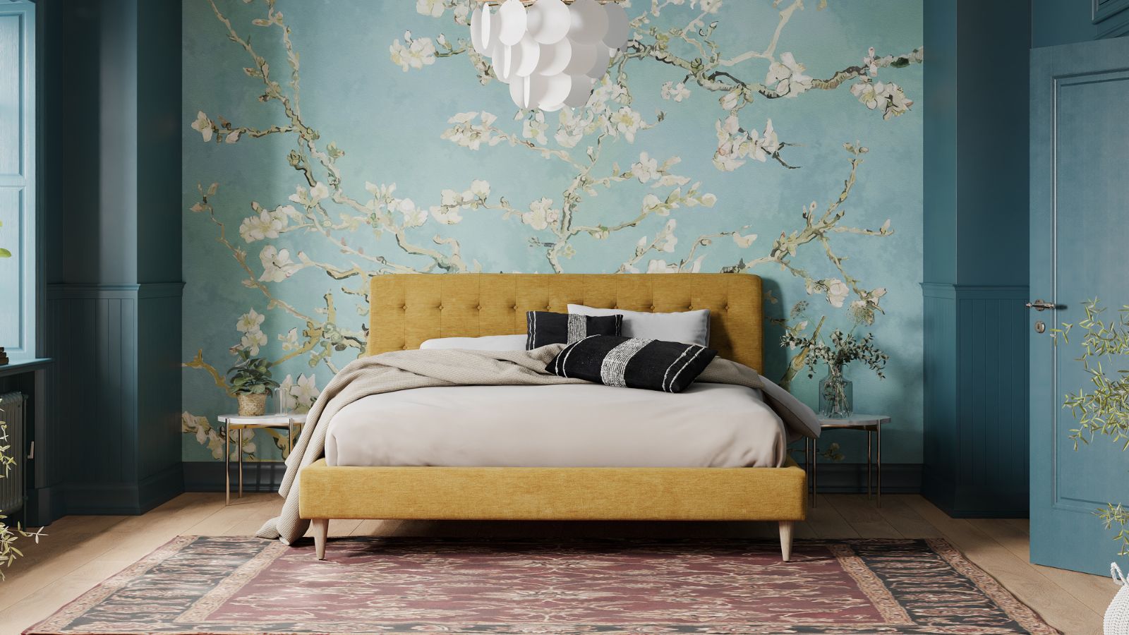 Pale blue wallpaper with white blossoms in a blue color drenched bedroom with wooden floors, pale red rug, low profile yellow modern bed with button back headboard