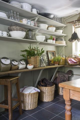 small utility room ideas - cottage utility room shelving