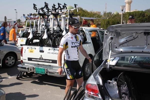 Mark Cavendish (HTC-Highroad) emerges from the team car.