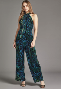 Anthropologie Eva Franco Velvet Halter Jumpsuit | $180/£148
Another emerald green-hued number, but this time cut from swathes of rich velvet—perfection, right? Textured and patterned, this jumpsuit is a real winner and can be dressed up or down, depending on the wedding's dress code.