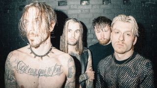 Paleface Swiss looking moodily at the camera