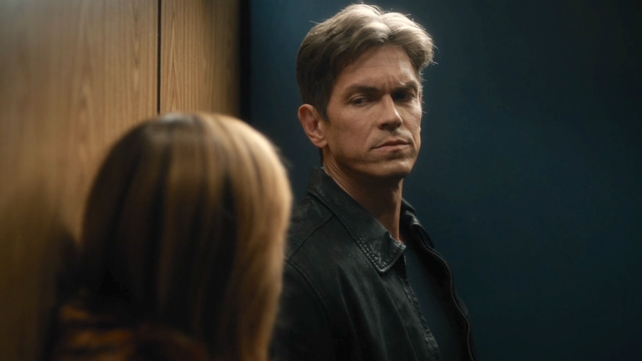 Nick Wagner looking at Morgan just before kissing her in an elevator in High Potential Season 2