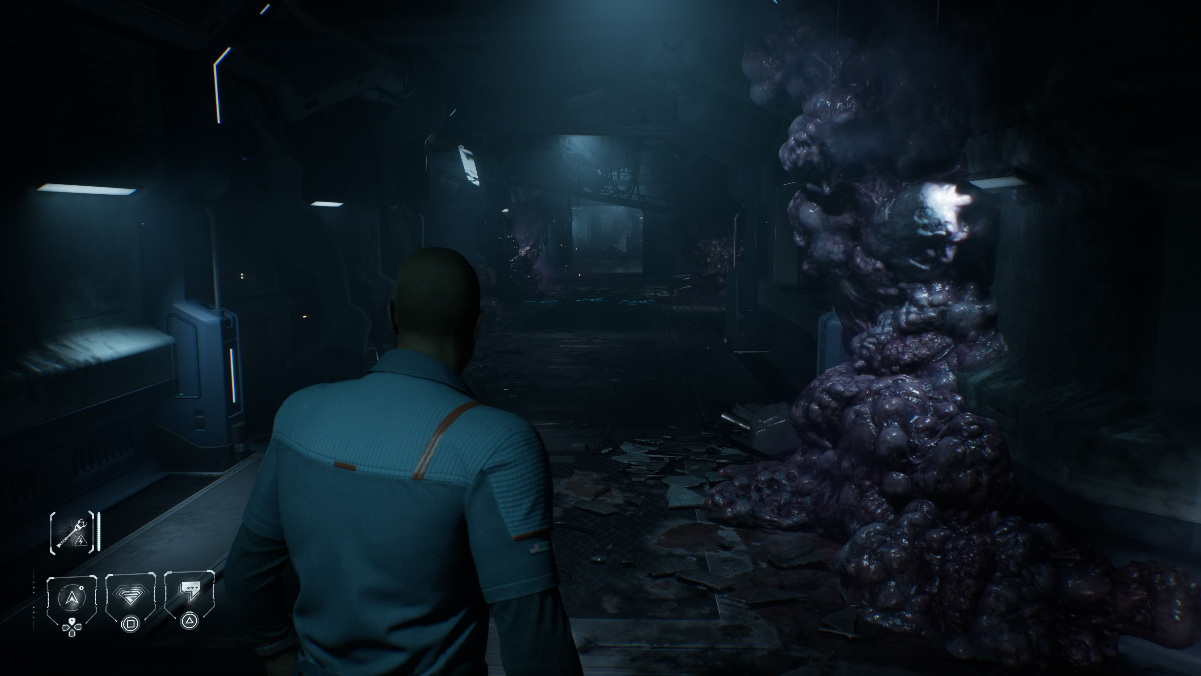Screenshot from Directive 8020 showing a character navigating a corridor with alien growths on one wall