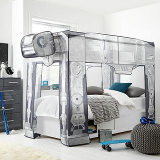 bedroom with armored transport camopy with white bed