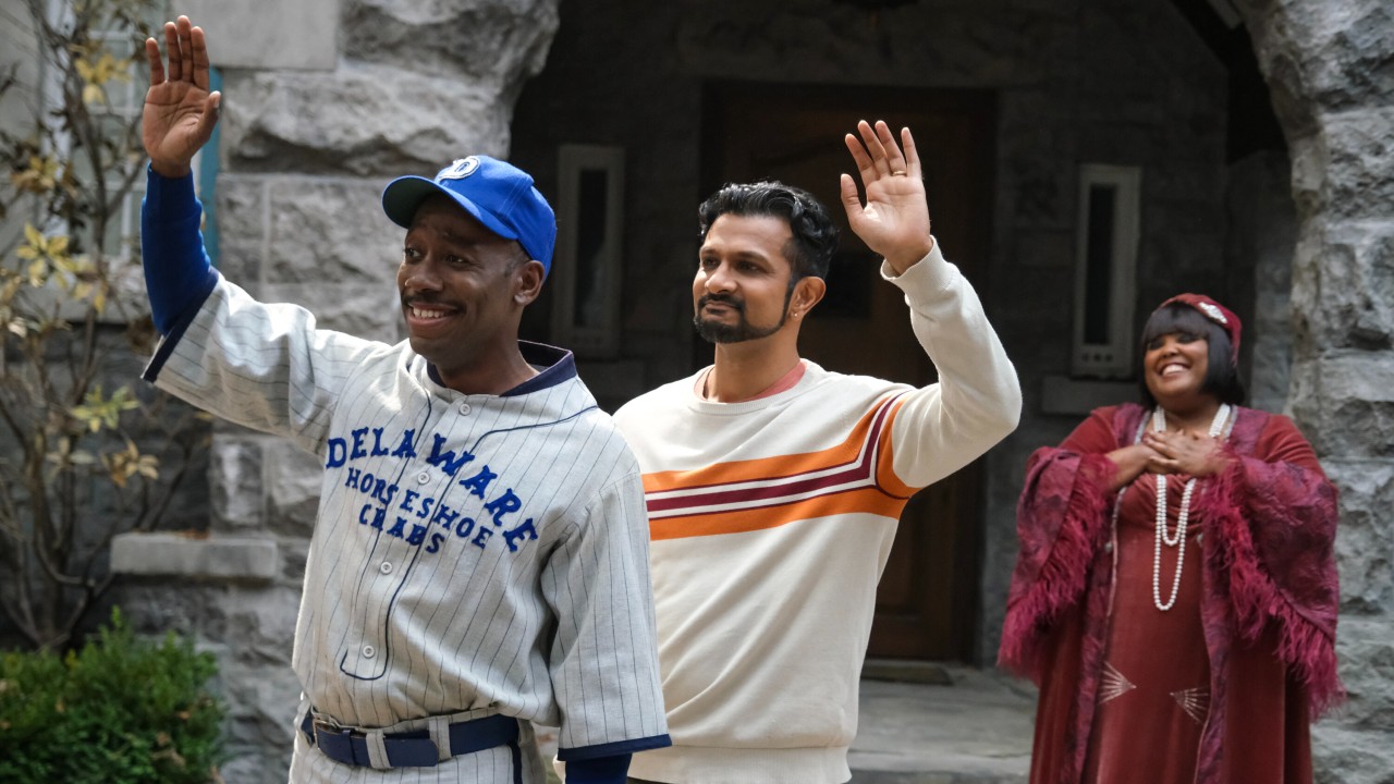 (L-R): Lamorne Morris as Saul waving with his left hand, Utkarsh Ambudkar as Jay waving with his right hand, and Danielle Pinnock as Alberta with her hands on her chest smiling.