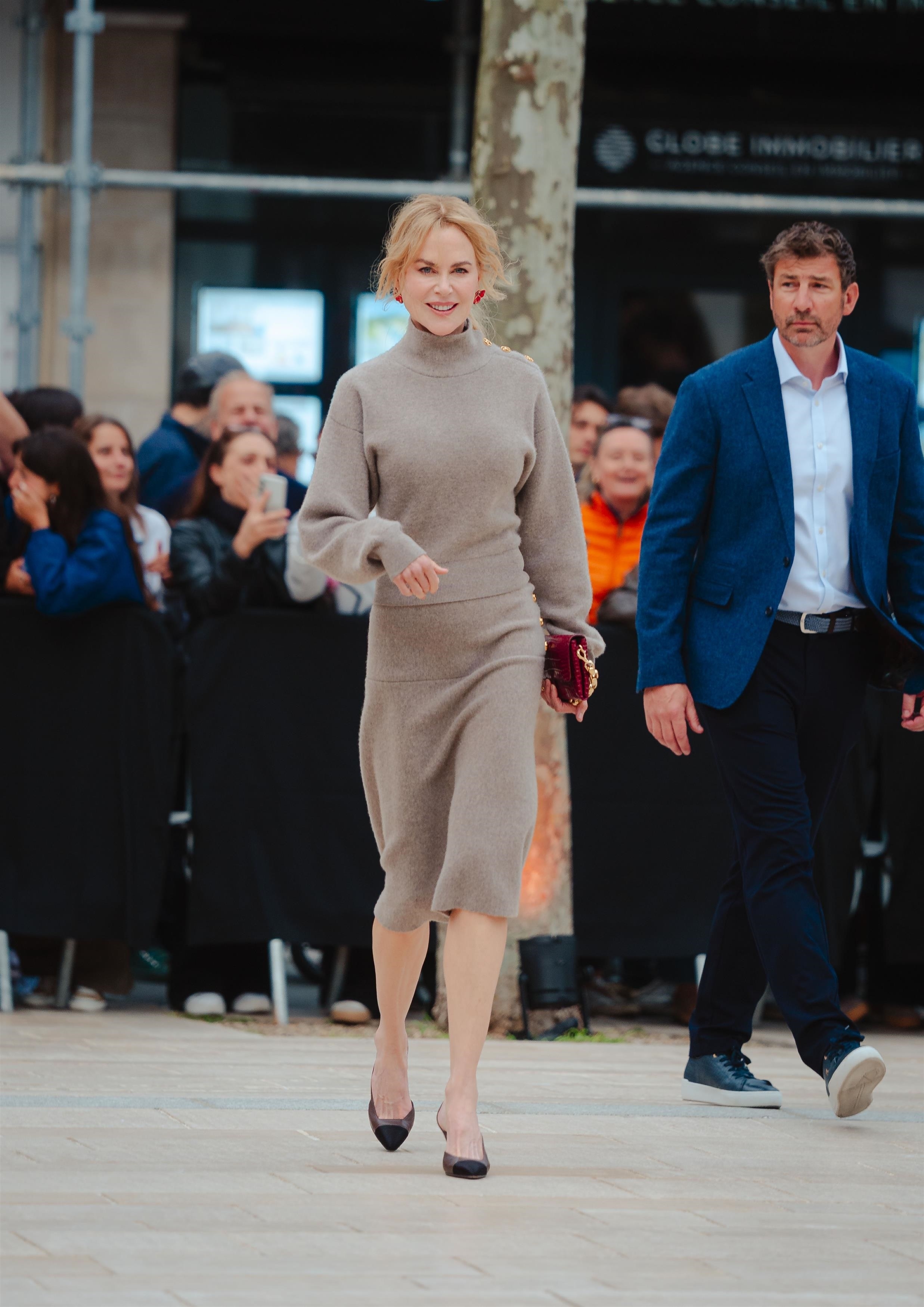 Nicole Kidman arrived at the Chanel cruise fashion show in France wearing a sweater skirt set for spring