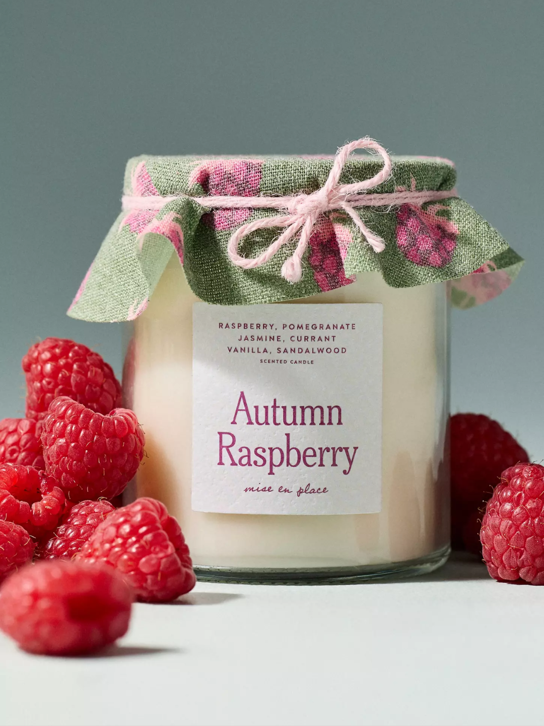 A jam jar style scented autumn raspberry candle by mise en place from Anthropologie