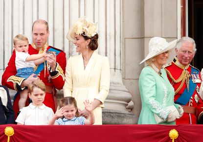 The Duke and Duchess of Cambridge, their children, plus Prince Charles and Camilla, waving to the public.