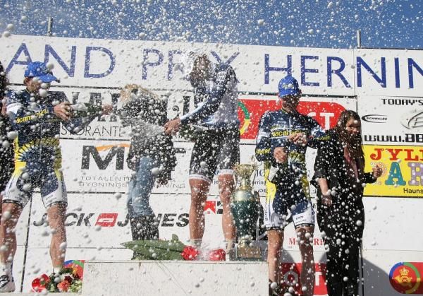 The place-getters let rip on the podium