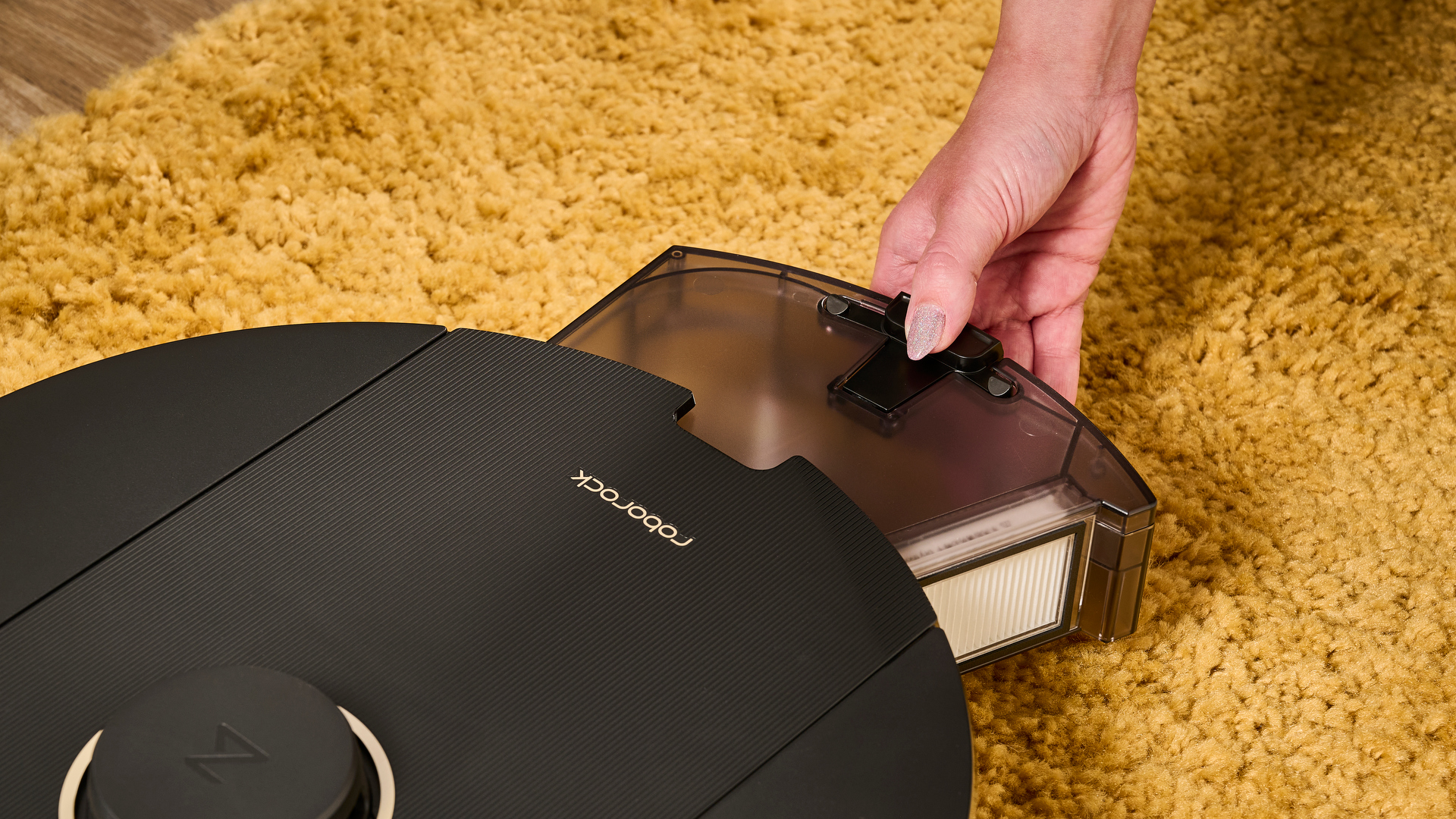 Roborock Q5 Pro+ robot vacuum with onboard dust bin pulled out