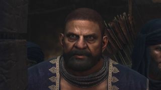 A close up of a man's scared face in Dragon's Dogma 2.