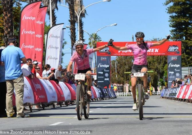 Catherine Williamson (left) and Alice Pirard celebrate their overall women's category victory at the 2014 Cape Pioneer Trek