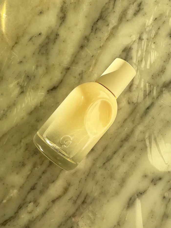 Glossier You Doux on a marble background