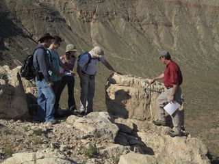 Meteor Crater serves as a "teachable moment" in geological time. Shown here are graduate students taking part in a 2011 field training program at the crater. Students are introduced to impact cratering processes. Skills developed during field camp are designed to prepare students for their own thesis studies in impact cratered terrains, be it on the Earth, the Moon, Mars, or some other solar system planetary surface.