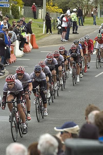 The Fly V Australia train lead the peloton in the final laps with Tour leader Bernard Sulzberger in seventh wheel.