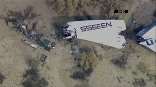 Pieces of of Virgin Galactic's SpaceShipTwo space plane are seen on the Mojave Desert floor after a deadly crash that killed one pilot and injured another on Oct. 31, 2014. 