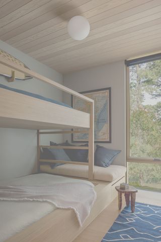 coastal guest bedroom with bunk beds