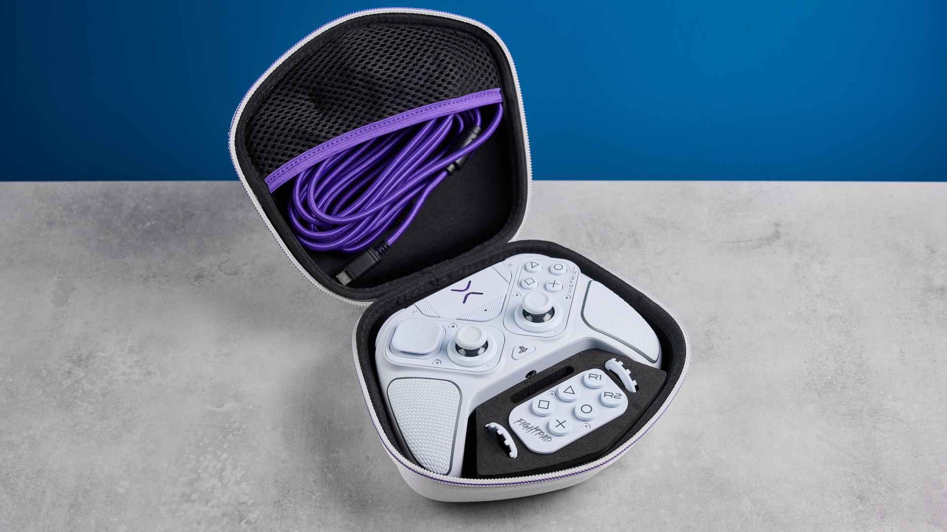 A white Turtle Beach Victrix Pro BFG Reloaded controller for the PS5