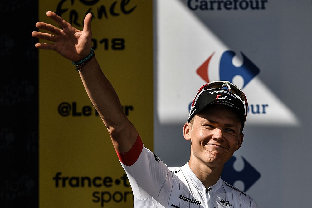 Toms Skujins (Trek-Segafredo) on the podium as the mountains classification leader