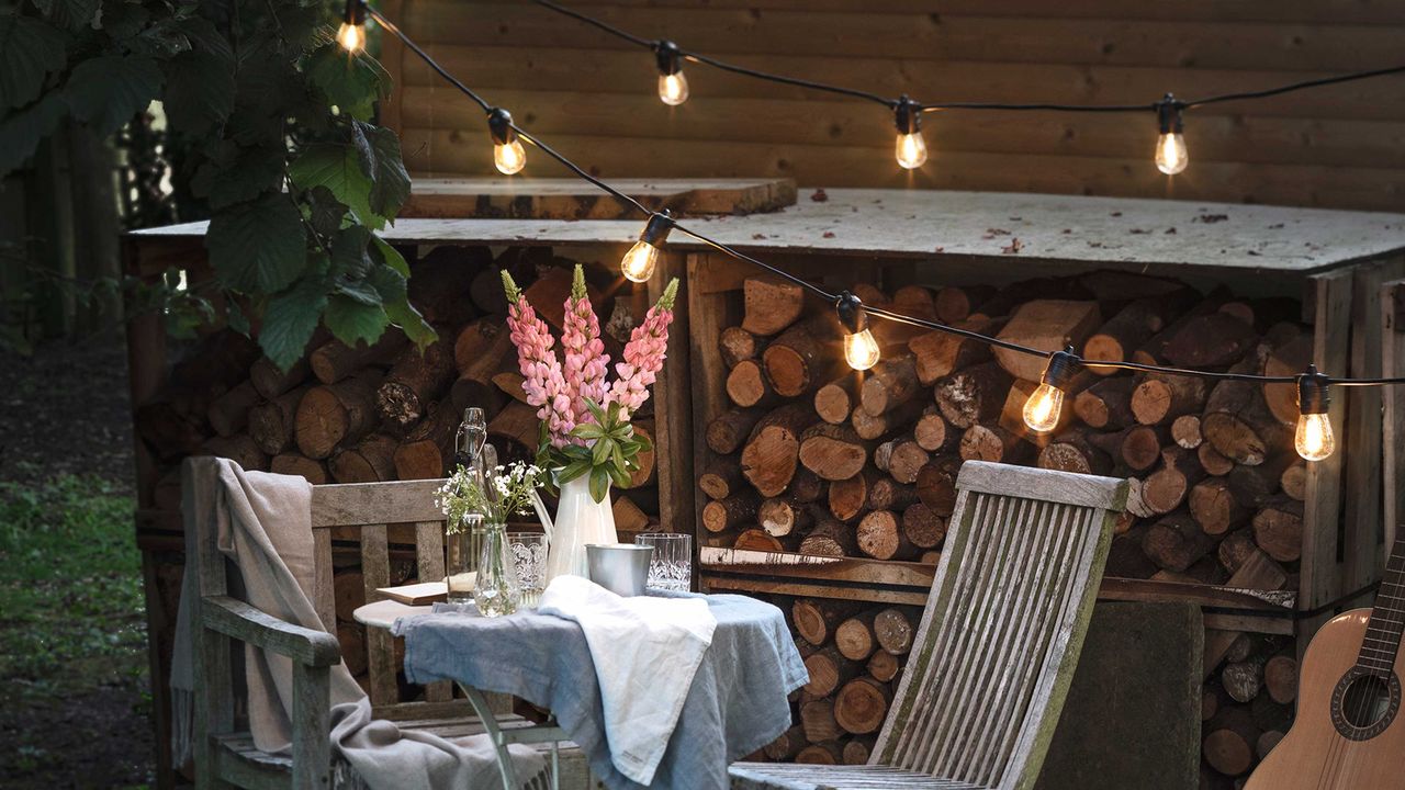 string light ideas - festoons from lights for fun with bistro set