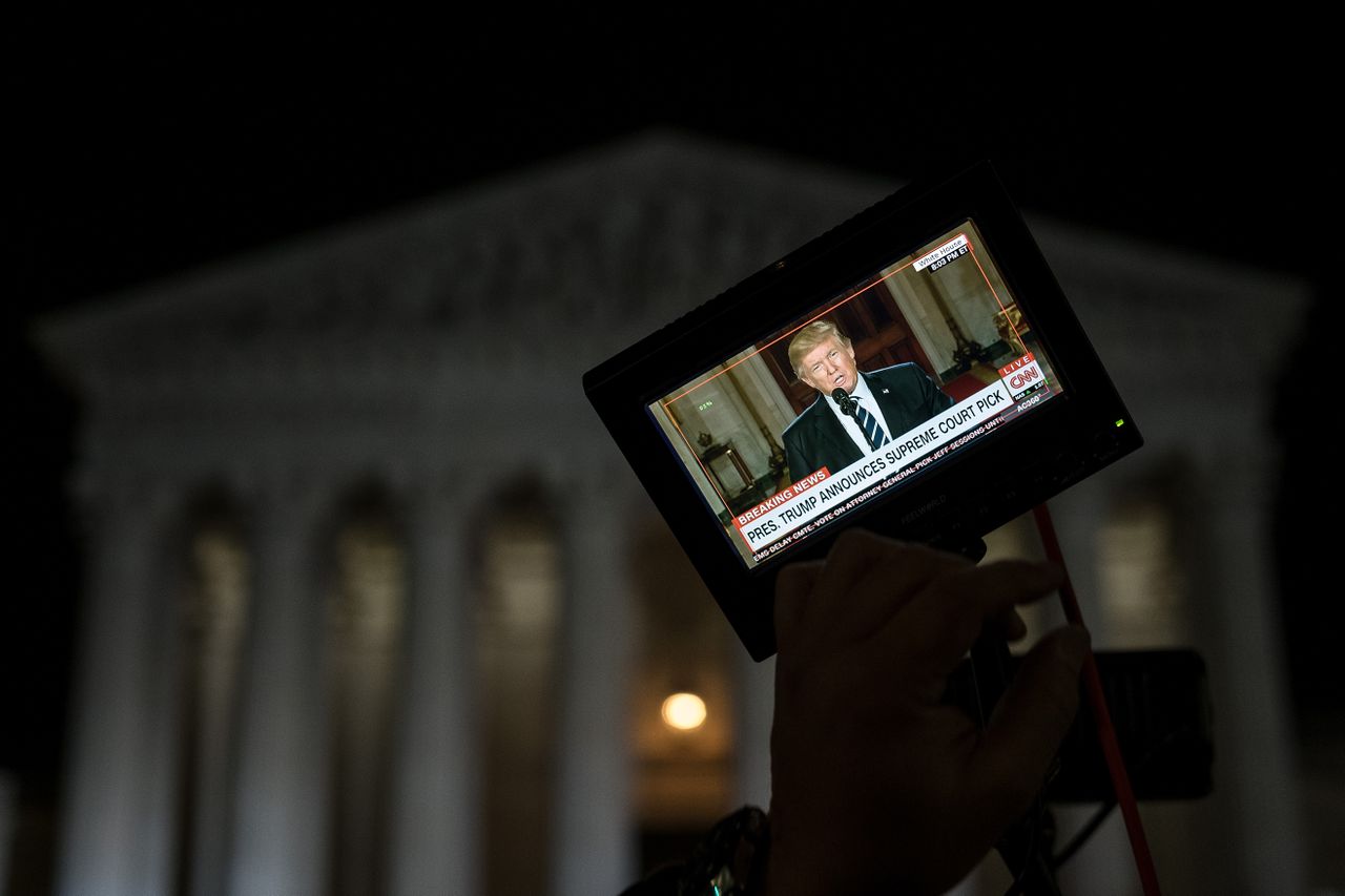 Trump seen through a camera&amp;#039;s monitor