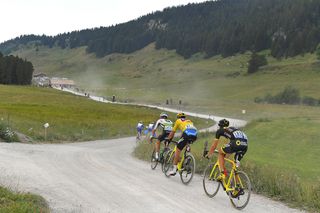 Serge Pauwels (Dimension Data), Greg Van Avermaet (BMC Racing) and Rein Taaramee (Direct Energie) ride in the gravel during stage 10 at the Tour de France