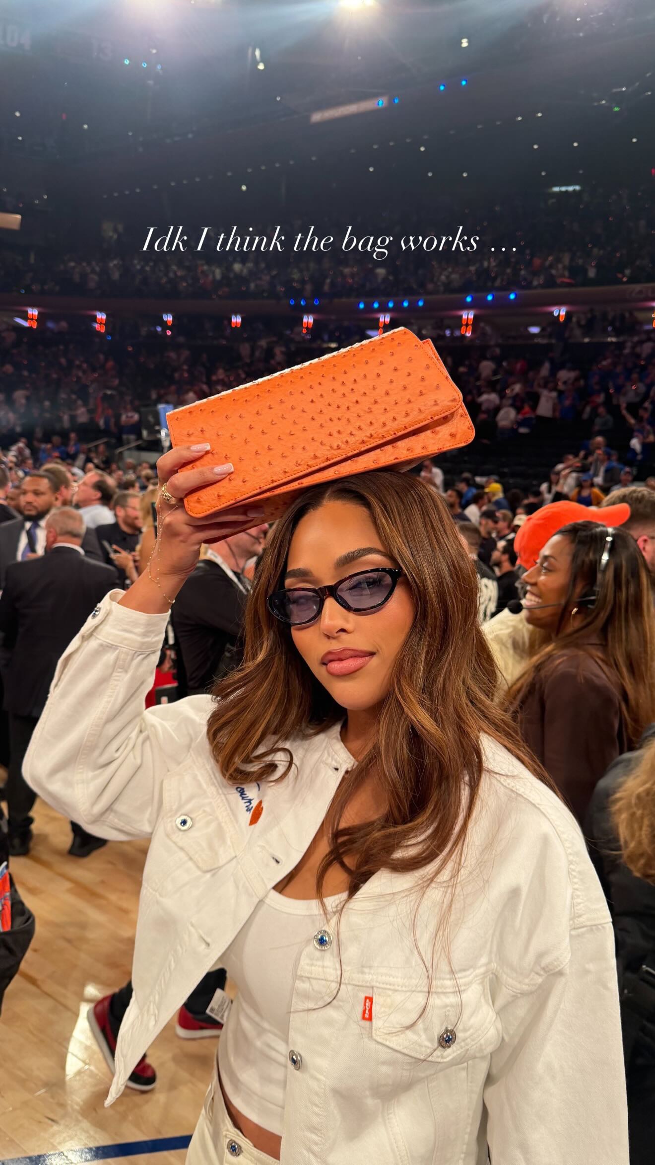 Jordyn Woods wore her lucky Woods by Jordyn bag to Game 4 of the Knicks NBA Finals