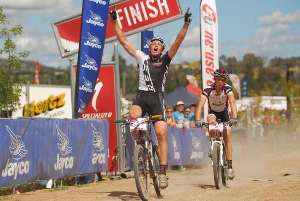 Paul Van Der Ploeg celebrates a win in the short track XC.