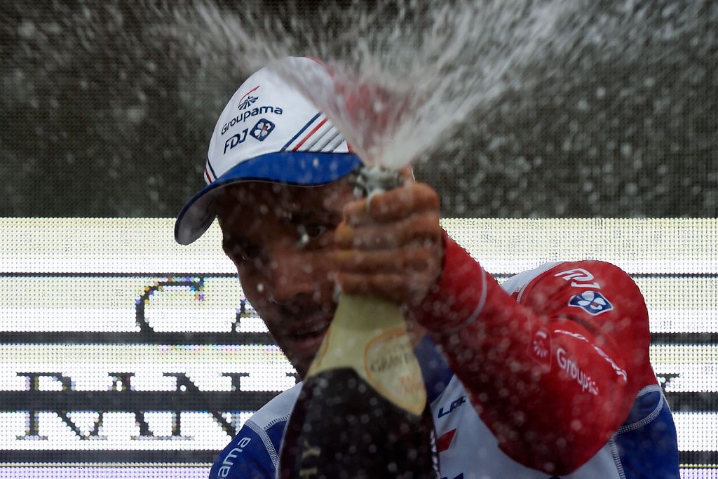 Thibaut Pinot sprays the champagne