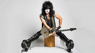 Paul Stanley with his signature-model guitar, the Ibanez PS10