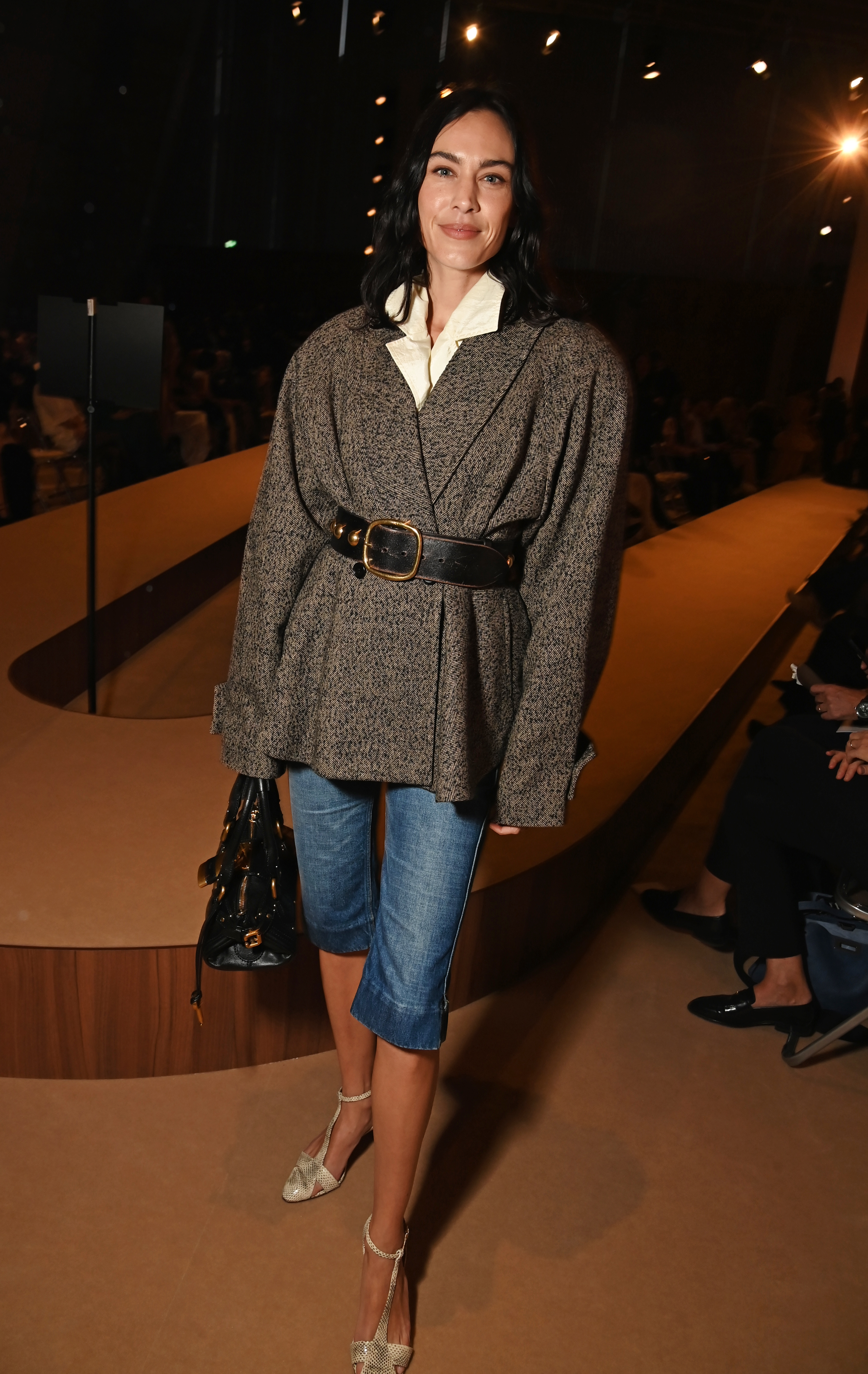 Alexa Chung wears denim capri pants while out in Paris attending Chlo&amp;eacute;&#039;s spring/summer 2026 show.