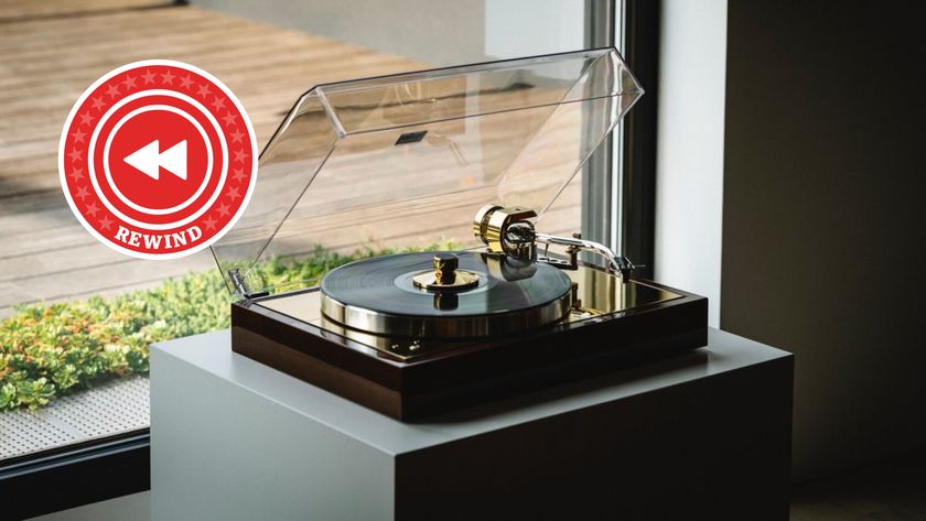 Pro-Ject turntable on desk with Rewind logo