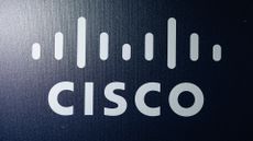 Cisco logo and branding in white lettering pictured against a grey-blue background at the InCyber Forum in Lille, France.