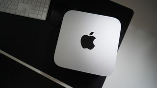 Photograph of Mac Studio M2 Ultra 2023 on desk beside keyboard