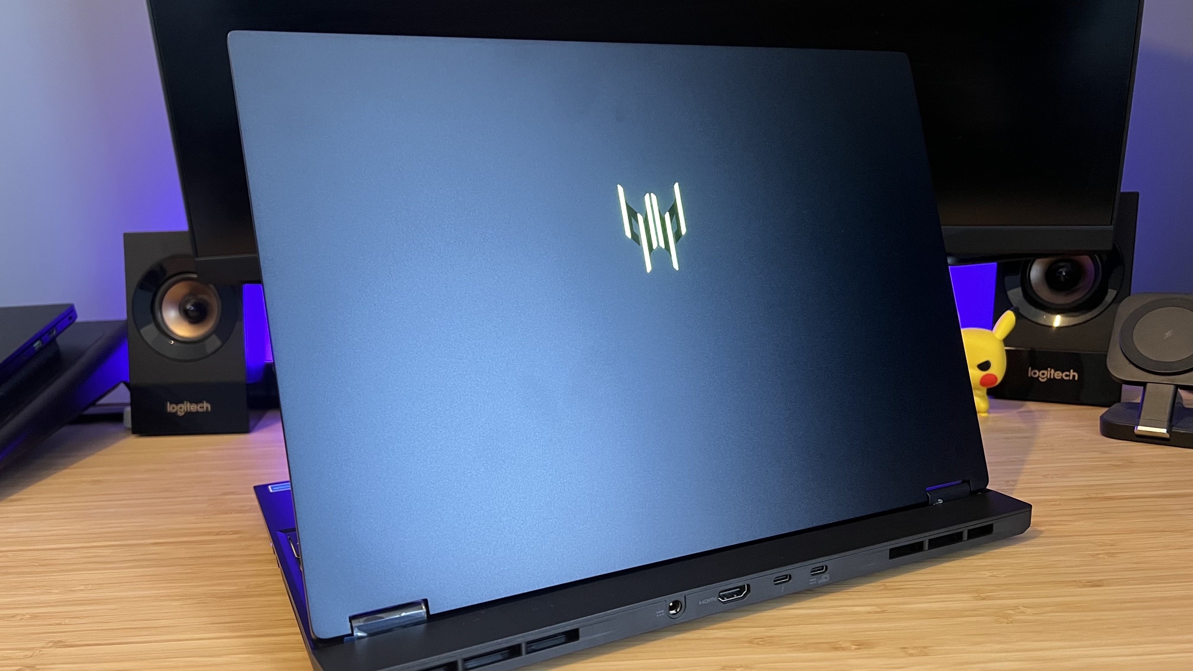 Back panel of Acer Predator Helios Neo 16S AI lid on a wooden desk