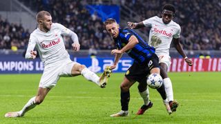 Davide Frattesi of Internazionale (C) is fouled ahead of the Salzburg vs Inter live stream
