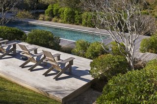 pool deck with wood decking furniture