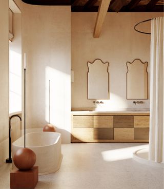 A bathroom in natural materials with two irregular-shaped mirrors
