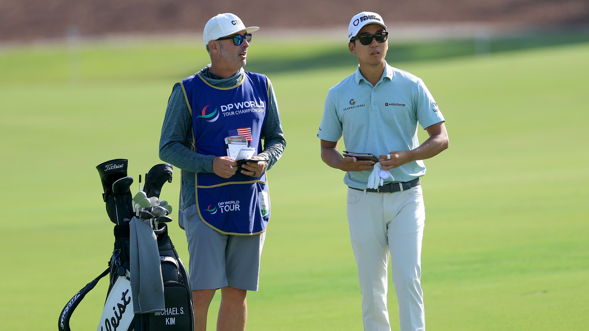 Michael Kim and his caddie during the DP World Tour Championship