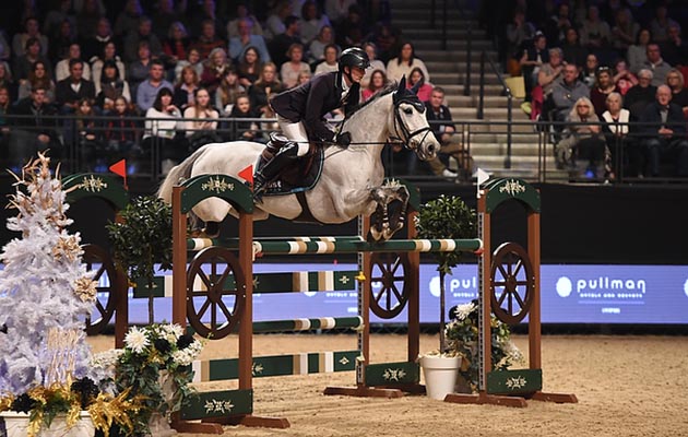Felix Hassmann riding SL Brazonado winner of Class 18 (1.45m Speed) at the Equestrian.com Liverpool International Horse Show at Echo Arena, Liverpool, UK; on 2nd January 2017