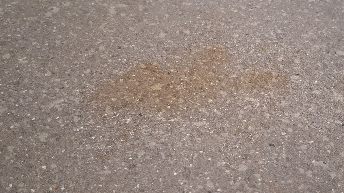 Ketchup smeared on lino before mopping test
