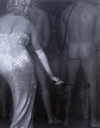 Nude men with Madonna in silver dress in Sex book
