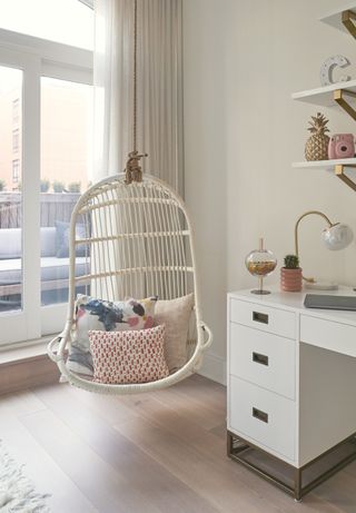 A teen's room with a inbuilt swing