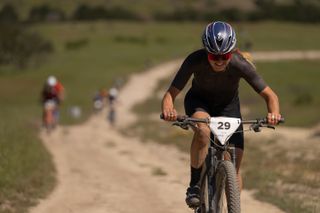 Moriah Wilson rides at the front of the women's open field in Monterey, California